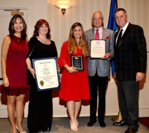 The Owner and President of The Whaler's Inn pose with Chamber of Commerce Board Members. 