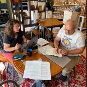 Two People Drafting a Climate Change Bill