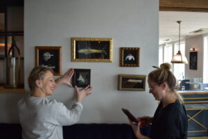 Framing gallery wall at The Shipwright's Daughter 